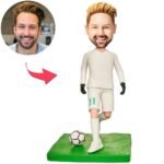 Soccer bobblehead in white sportswear