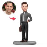 Male teacher bobblehead in black suit
