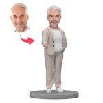 Boss bobblehead in white suit shake hands