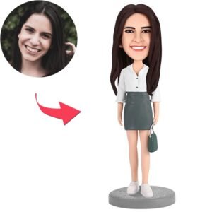 Woman bobblehead holding a bag