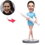 Nurse bobblehead in blue clothes