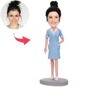 female nurse bobblehead in a blue suit
