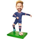Soccer player bobblehead in blue uniform