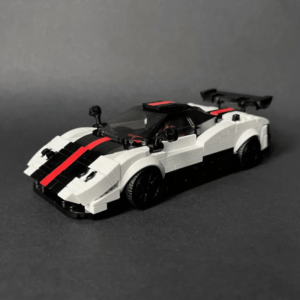 White and black sports car building blocks model with red racing stripe, detailed mini brick supercar displayed on a dark background