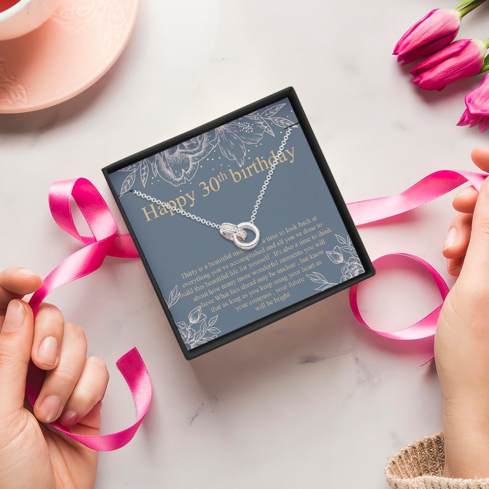 Personalized necklace gift box with “Happy 30th birthday” message card and customizable text, featuring a silver pendant on a chain with purple ribbon packaging
