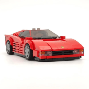 Classic red sports car building blocks model with sleek design, detailed front grille and headlights, displayed on a clean background