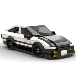 White and black brick-built sports car model with sleek design and low profile on a plain background