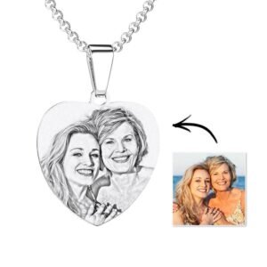 Heart-shaped personalized photo necklace with engraved sketch of two women, shown alongside the original color photo for customization preview