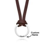 Brown leather cord necklace with silver ring pendant engraved “Wiliams,” customizable name design.