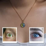 Personalized eye color necklace with round pendant featuring a custom iris design, shown on a model’s neck with sample green and blue eye photos for customization