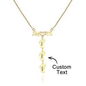 Customizable gold necklace for Mom with three hanging baby footprints engraved with names Avery, Rylee, and Kylee, showing a heart-shaped chain attachment, designed to project a personalized photo below