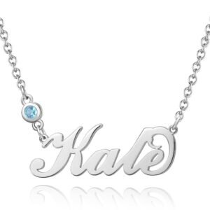 Personalized silver necklace featuring the name 'Kate' in elegant cursive script, accented with a small round blue gemstone on the chain, isolated on a white background.