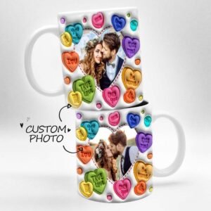 Stacked white ceramic mugs featuring a custom romantic design with colorful candy-heart illustrations around heart-shaped photo frames of a couple. The mugs display two different couple photos, with handwritten-style text reading “Custom Photo,” showcasing personalized love-themed drinkware.